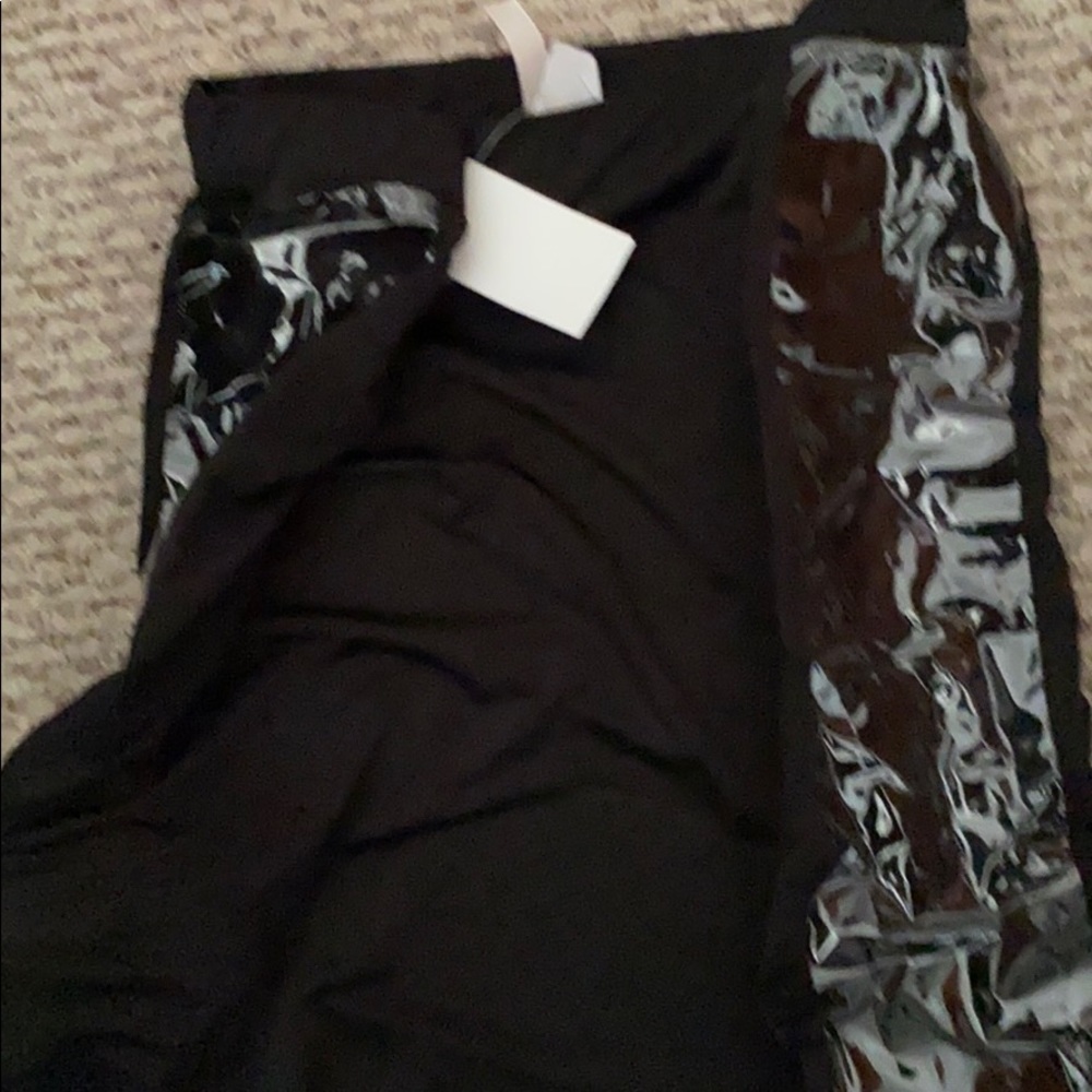 A black see through skirt on the side